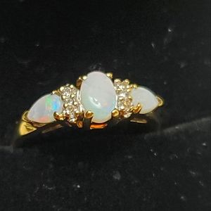 10k gold ring. Opal with little diamonds.